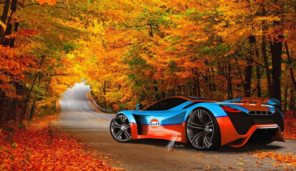 The Autumnal Showcase: A Stunning Blue and Orange Ferrari Parked Amidst Vibrant Foliage Wallpaper