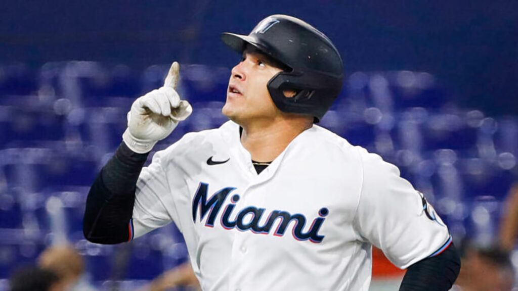 Avisail Garcia celebrating in Miami Marlins uniform on baseball field with stadium background Wallpaper