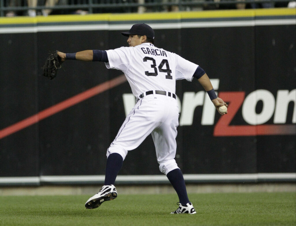 Avisail Garcia wearing number 34 Rays jersey ready to make a play in dynamic baseball wallpaper