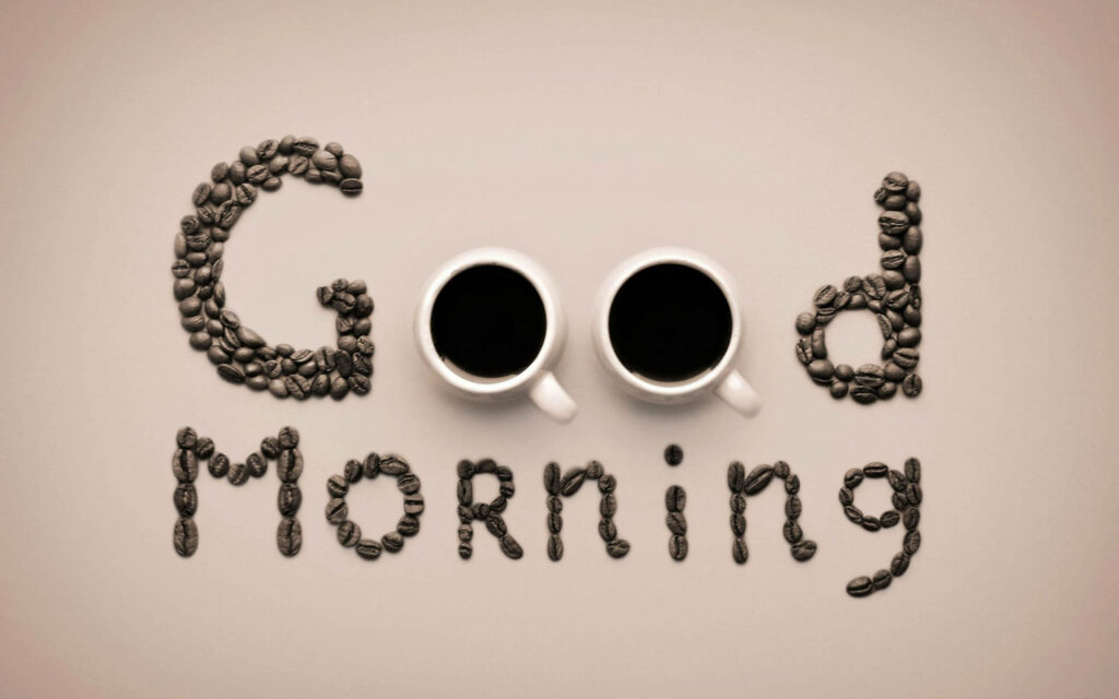 Good Morning spelled with coffee beans and cups on bright minimalist coffee lover wallpaper