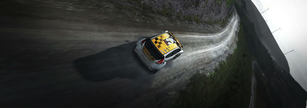Majestic Aerial Perspective of 'Dirt Rally' Car Tackling a Muddy Terrain Amidst Gloomy Weather Wallpaper