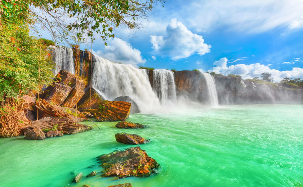Dray Nur Waterfall Vietnam turquoise waters rugged rocks lush greenery vibrant nature wallpaper