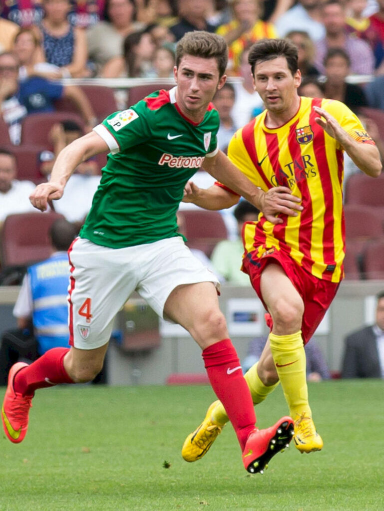 Aymeric Laporte defensive block during intense football match showcasing strong skills wallpaper