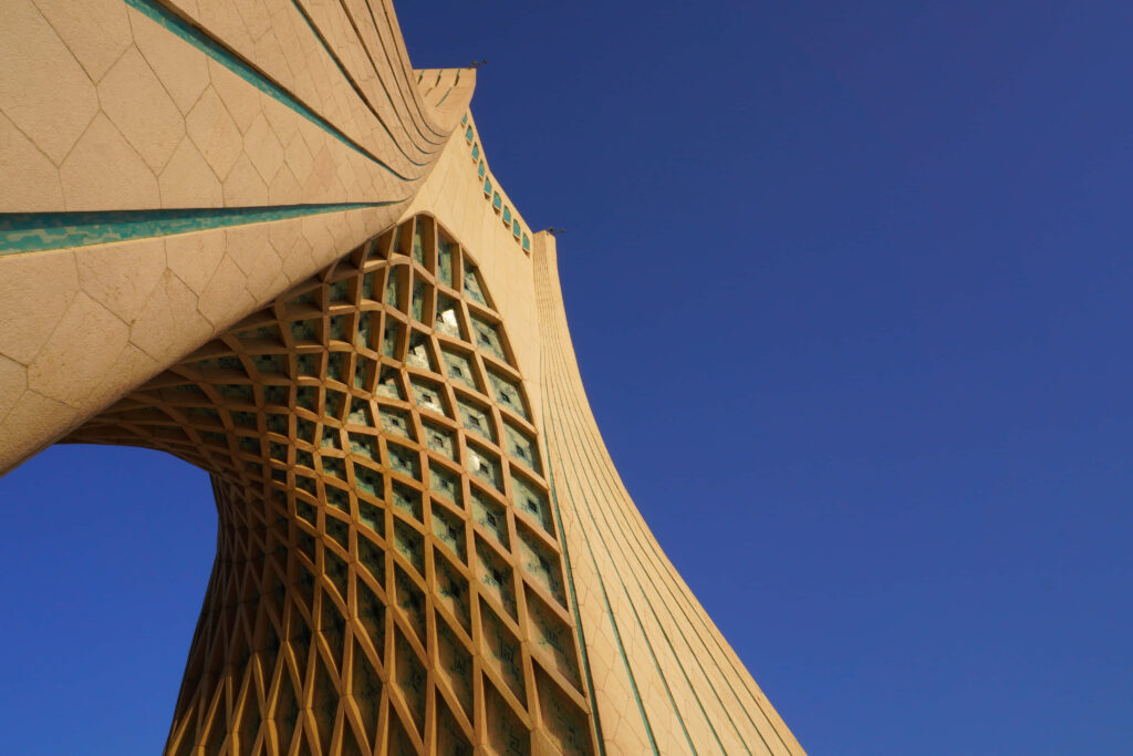 Azadi Tower in Tehran Iran under clear blue sky modern architectural landmark wallpaper