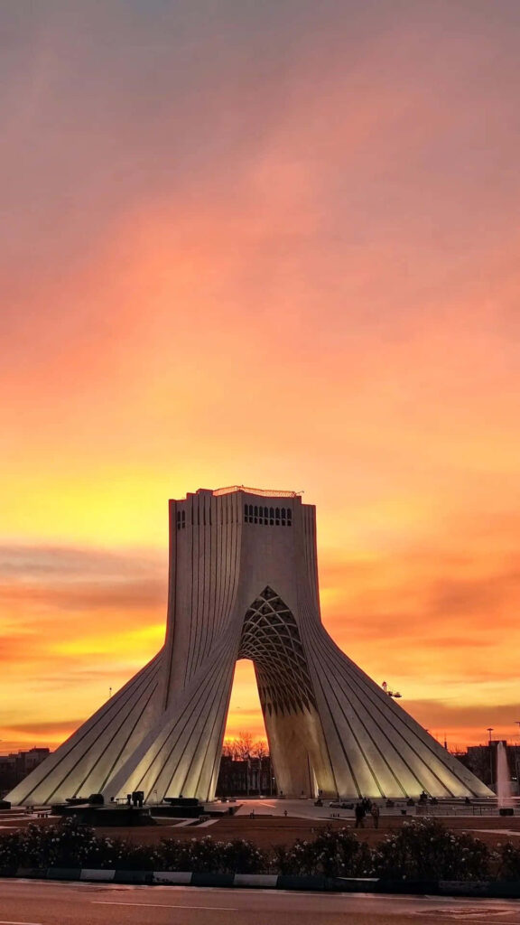 Azadi Tower at sunset Tehran skyline vibrant colorful iPhone wallpaper background view