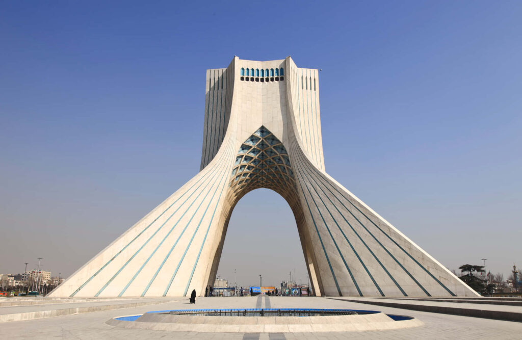 Azadi Tower Tehran under clear blue sky iconic Iranian architecture cultural landmark wallpaper