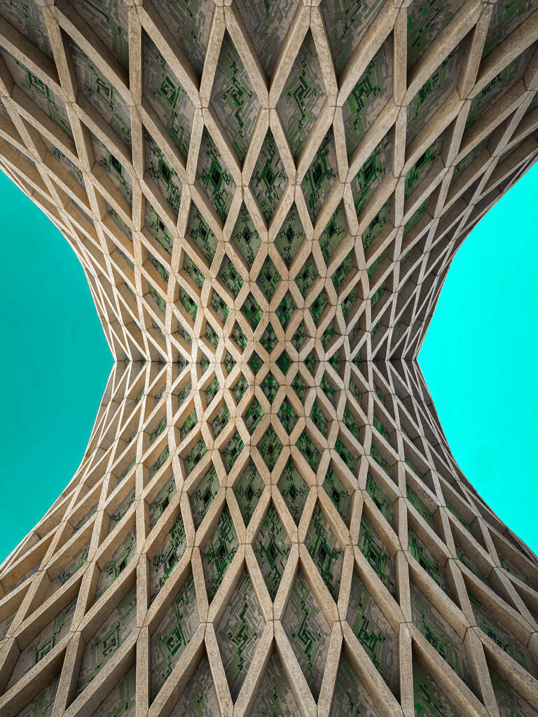 Azadi Tower Tehran geometric architecture with vivid green sky striking wallpaper background