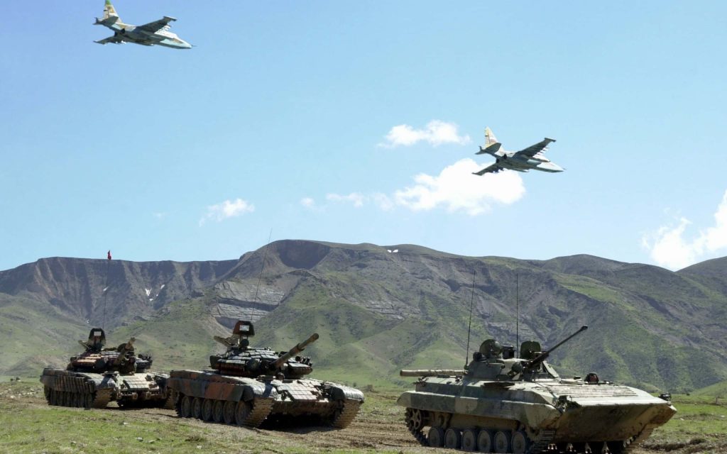 Azerbaijani T-72 tanks and BMP-2 with Su-25 jets in mountainous military exercise wallpaper background