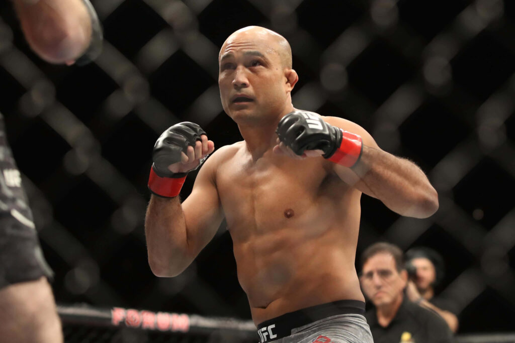 B.J. Penn The Prodigy focused boxing stance inside UFC octagon during intense MMA fight wallpaper