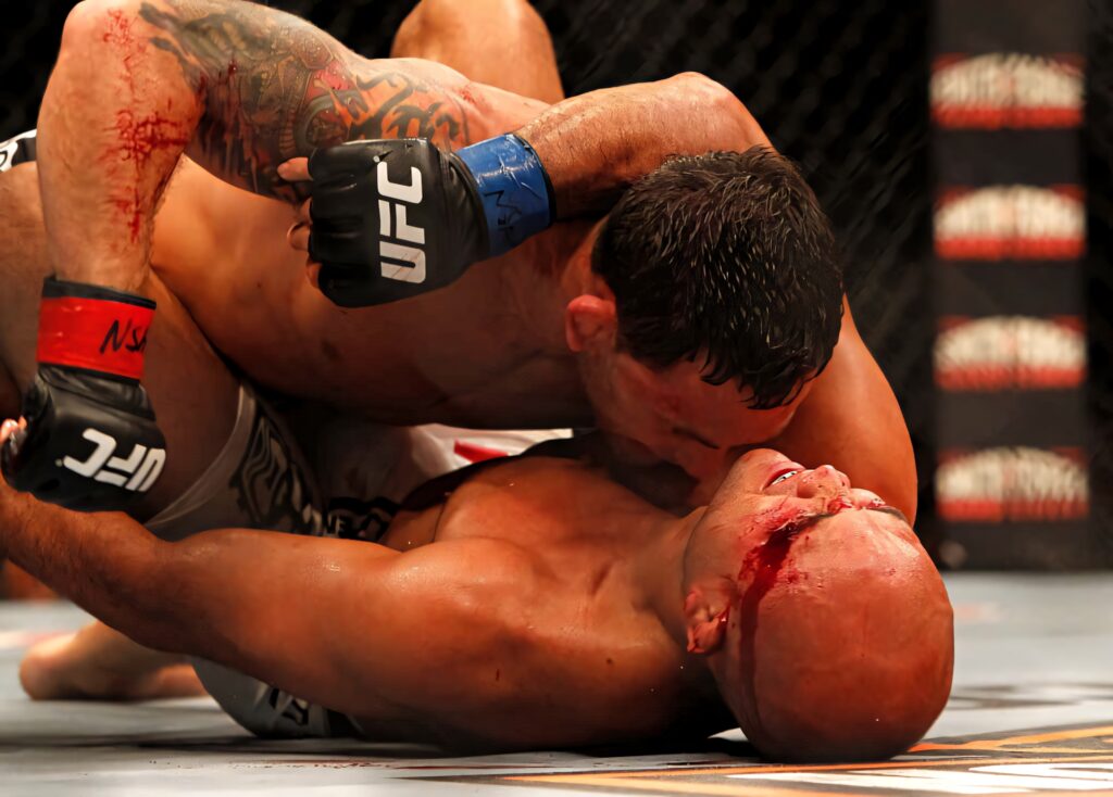 B.J. Penn fierce ground battle intense MMA fight UFC octagon professional mixed martial arts Wallpaper