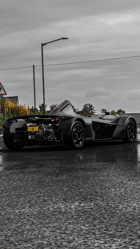BAC Mono rear view on rain slick road Forza Horizon 4 atmospheric open top sports car wallpaper