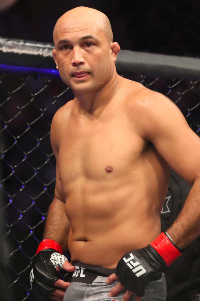 B.J. Penn focused in UFC octagon wearing gloves preparing for next fight wallpaper background