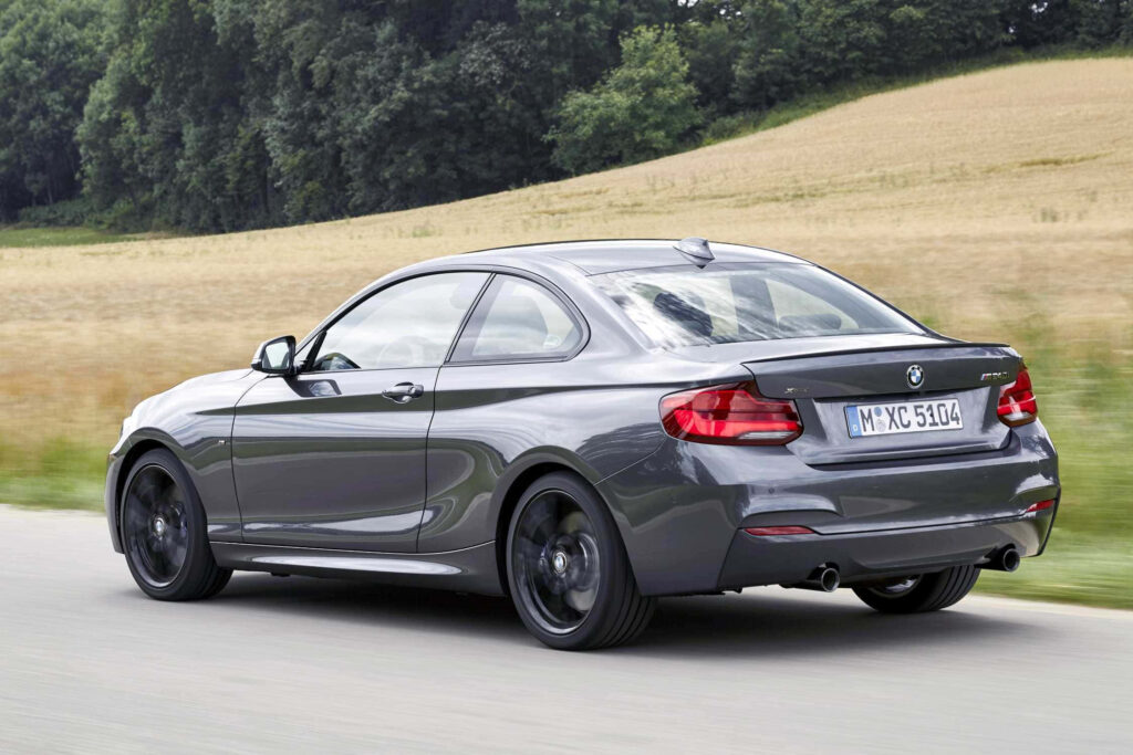 Dynamic BMW 2 Series Coupe: Scenic Motion Wallpaper Background