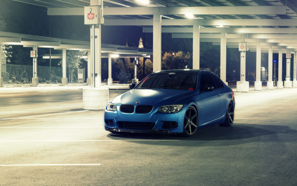 Sleek BMW E92 M3 in Matte Metallic Blue - Modern Parking Wallpaper