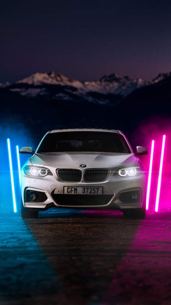 BMW M2 Wallpaper: Sleek Design with Neon Blue & Pink Lights