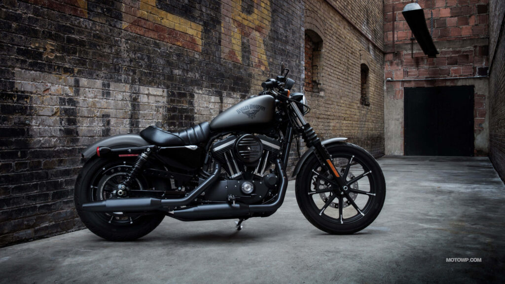 Matte BMW Motorcycle Wallpaper: Industrial Sunset & Brick Wall
