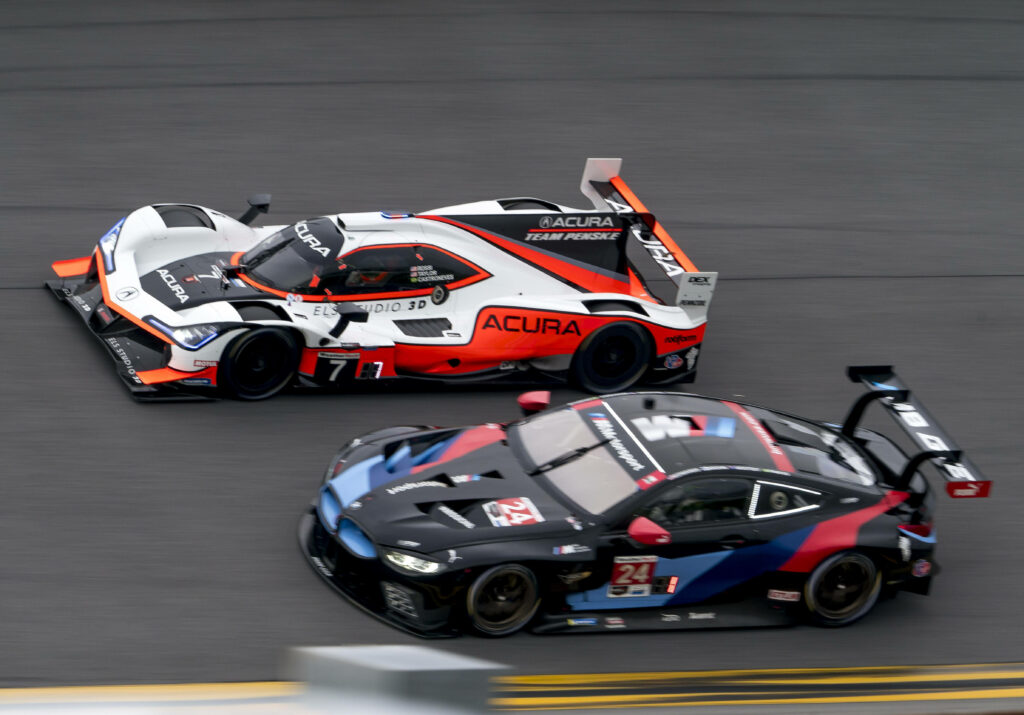 BMW Motorsport Team RLL BMW M8 GTE racing side by side on track high performance motorsport action wallpaper