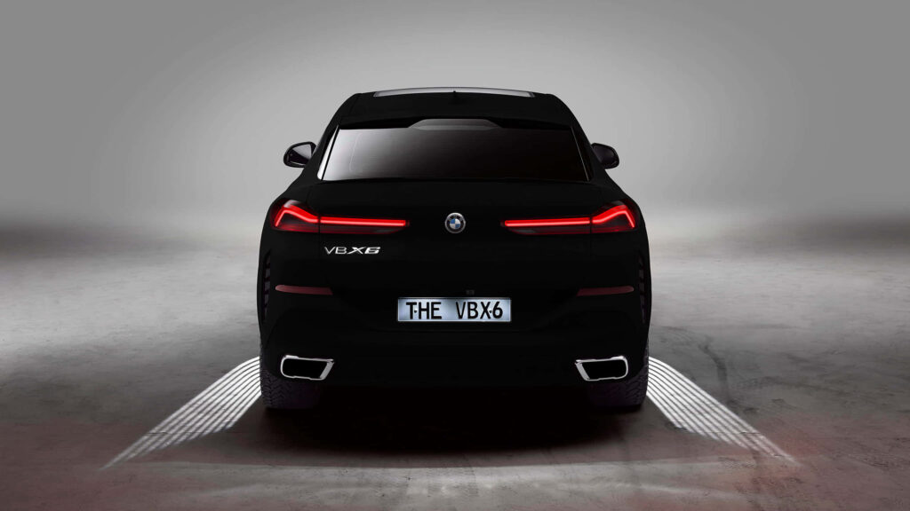 Rear view of BMW X6 Concept with sleek taillights and bold modern design wallpaper background