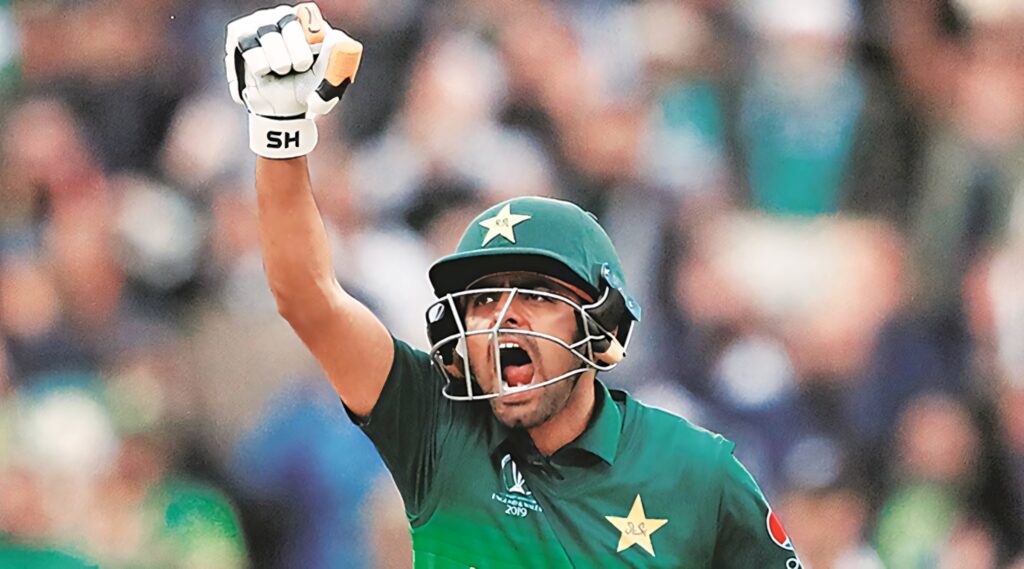 Babar Azam celebrating passionately in Pakistan cricket team uniform as determined captain wallpaper