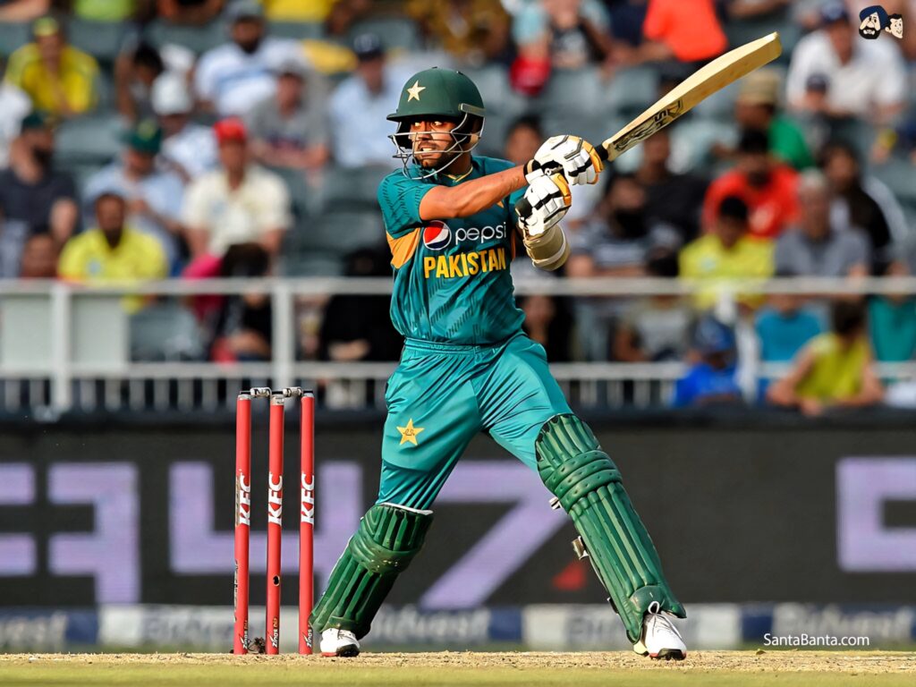 Babar Azam batting skillfully in Pakistan cricket jersey on field with wallpaper background