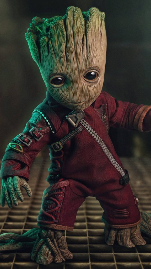 Baby Groot in detailed red Ravager suit 4K wallpaper with moody lighting and metallic textures