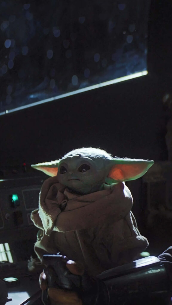 Curious Baby Yoda Wallpaper: Inside a Spacecraft from *The Mandalorian*