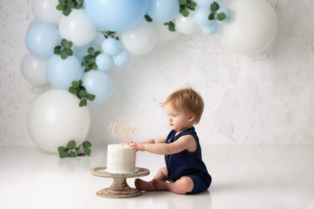 Baby's First Birthday Cake Smash: Charming Blue & White Celebration Wallpaper