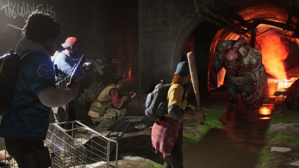 Back 4 Blood survivors ready to fight monstrous Reeker emerging from fiery tunnel wallpaper