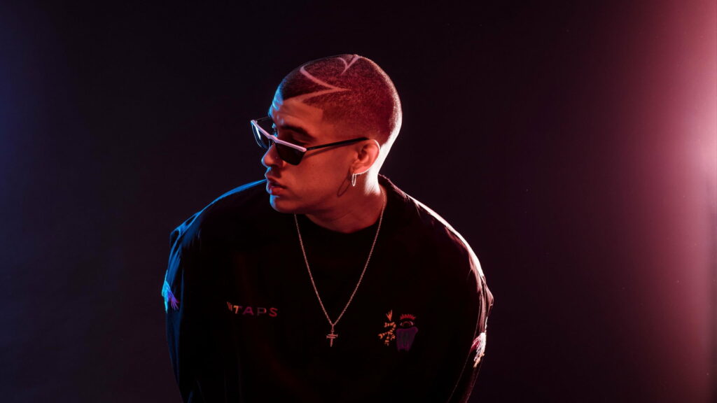 Bad Bunny: The Stylish Rapper Rocking a Black Dress in QHD Wallpaper