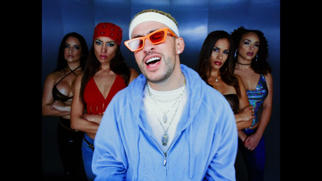 Bad Bunny with four stylish women bold vibrant wallpaper Puerto Rican rapper singer background