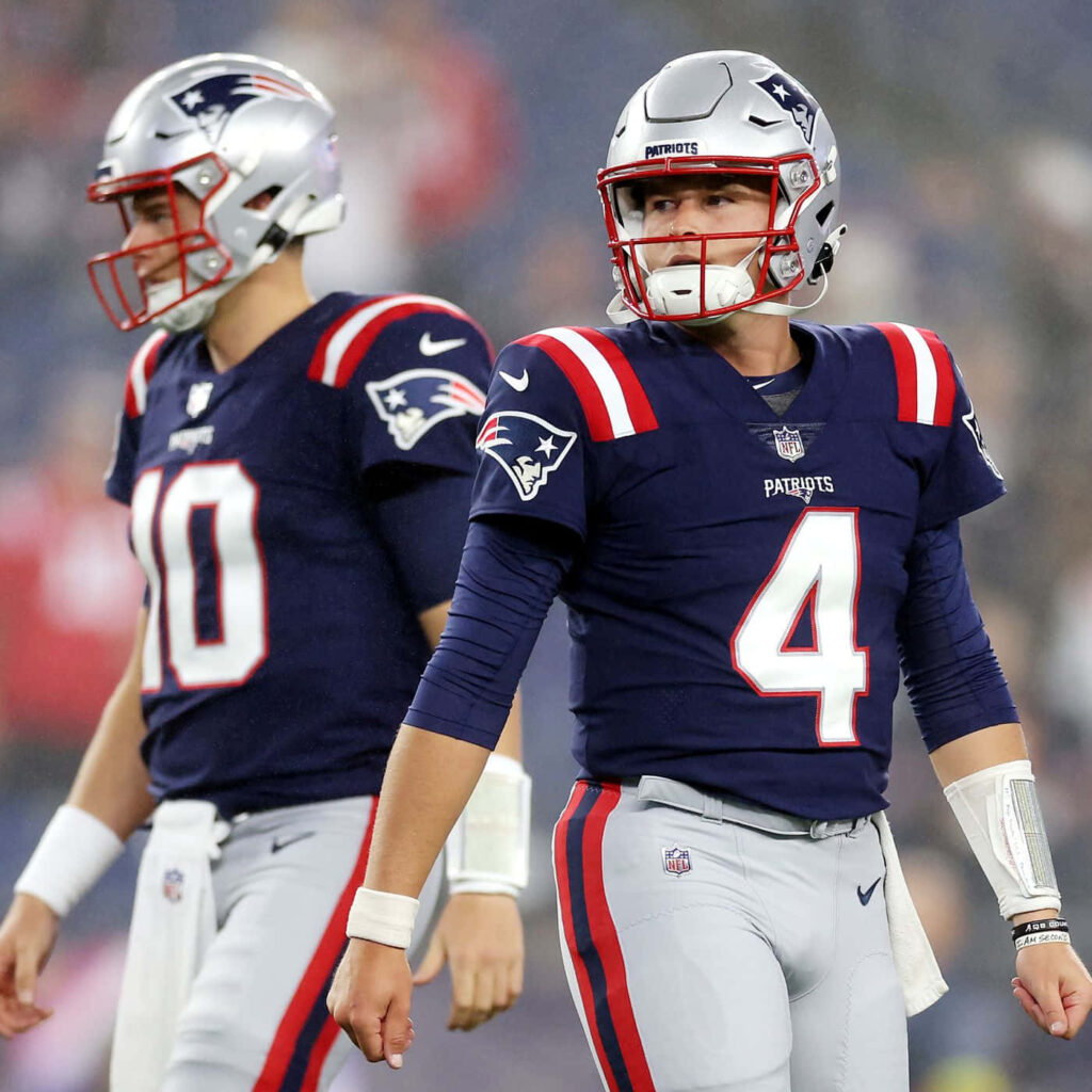 Bailey Zappe New England Patriots focused on field ready for action NFL game wallpaper background