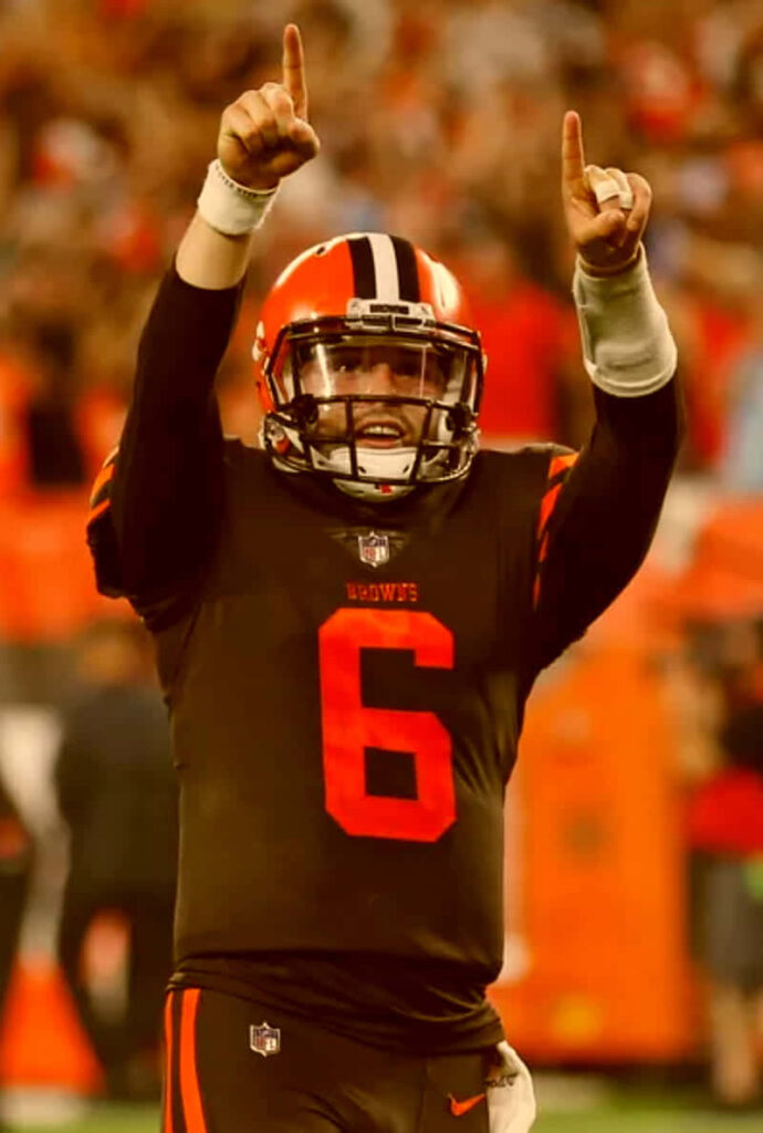 Baker Mayfield celebrates football victory on field motivational wallpaper hard work pays off