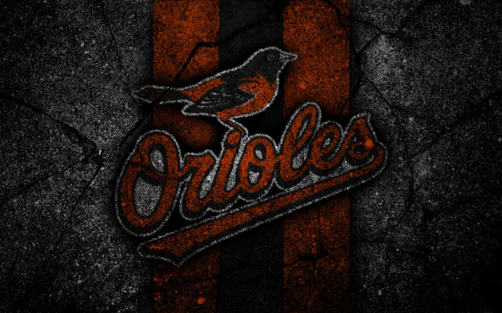 Baltimore Orioles logo in orange and black on textured black stone background wallpaper