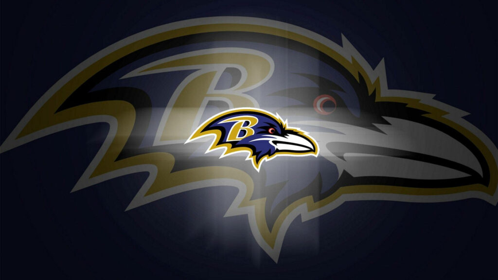 Baltimore Ravens logo wallpaper with raven head and bold B emblem on dark dramatic background