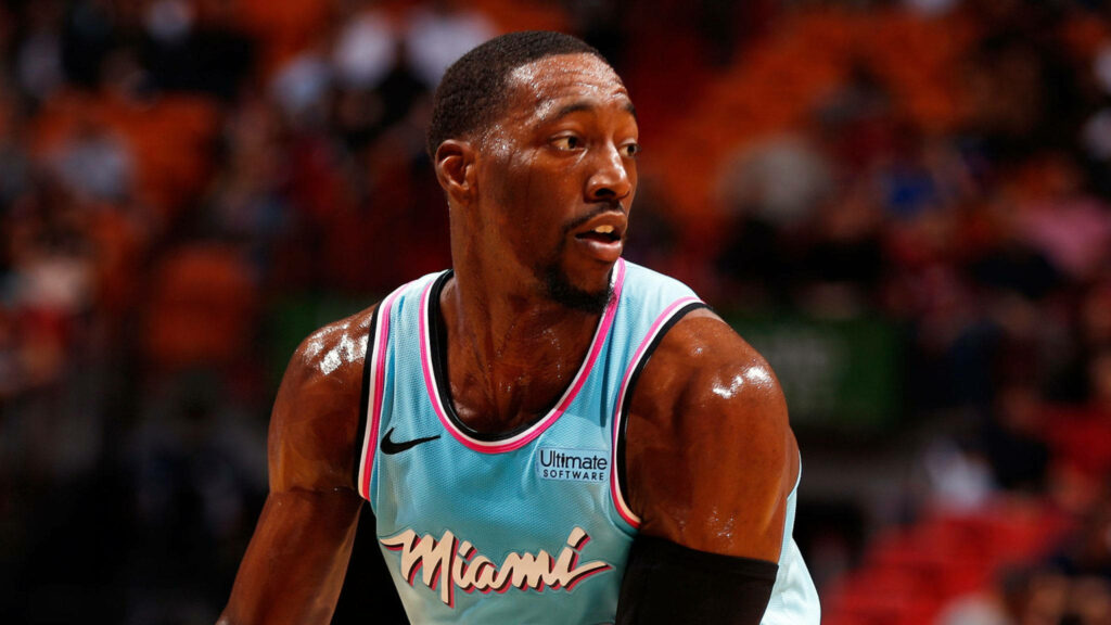 Bam Adebayo Miami Heat intense close-up action shot vibrant alternate jersey basketball game Wallpaper