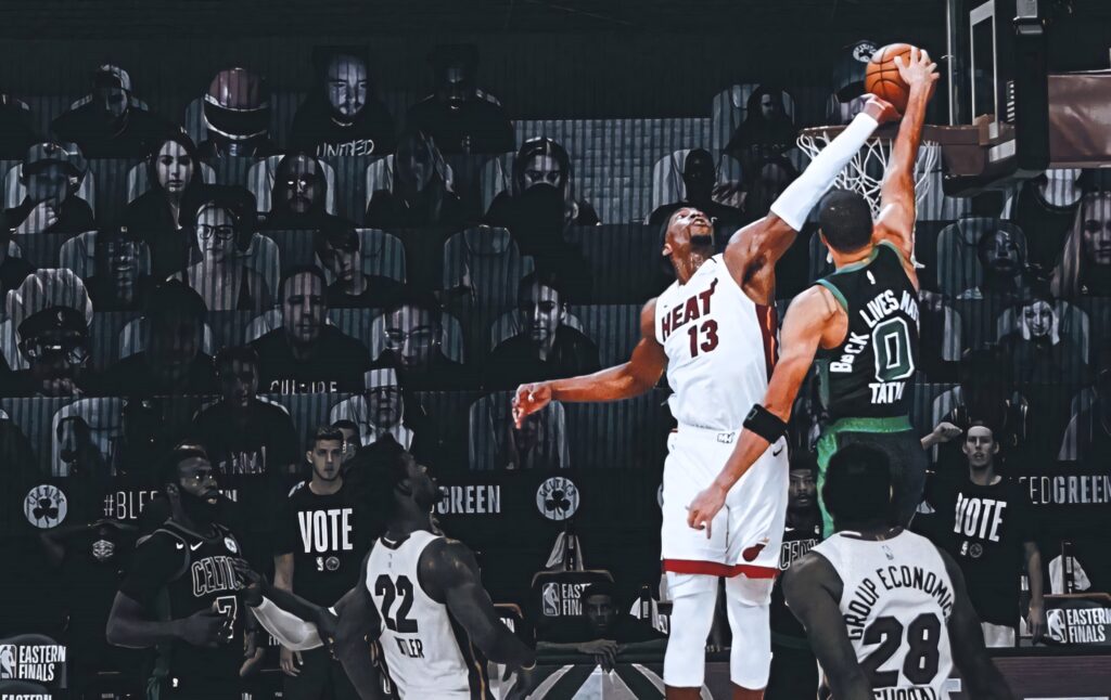 Bam Adebayo blocks Jayson Tatum intense NBA playoff moment selective focus wallpaper background
