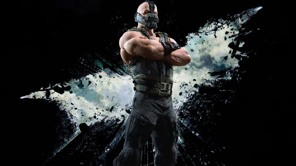 Bane from DC Comics stands with crossed arms and shattered bat symbol background wallpaper