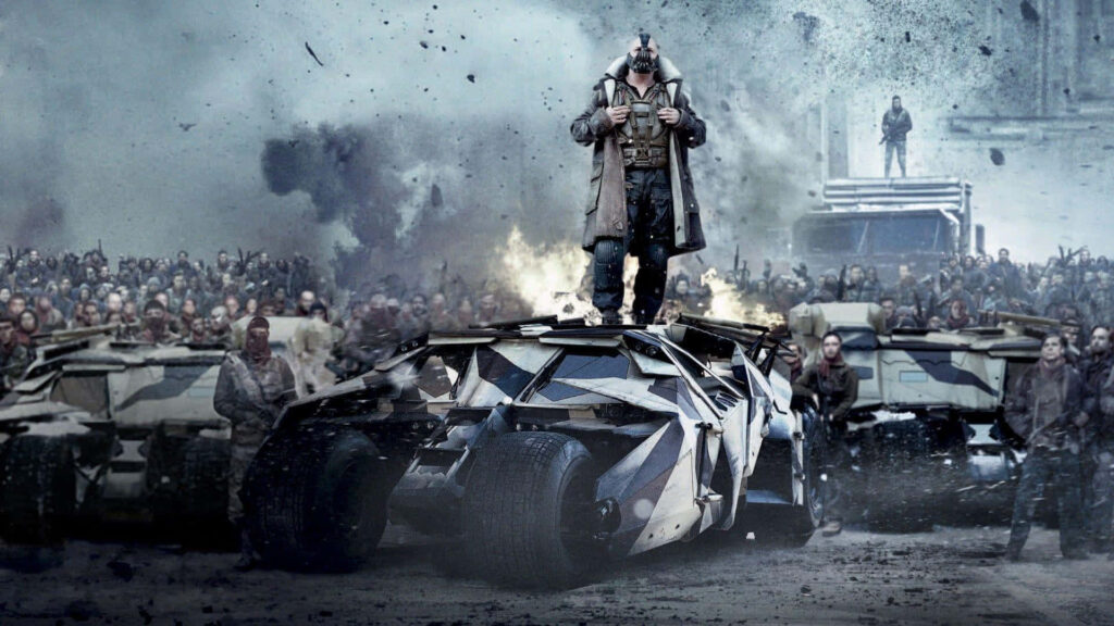 Bane dominating atop military vehicle amid chaotic crowd DC Comics wallpaper background