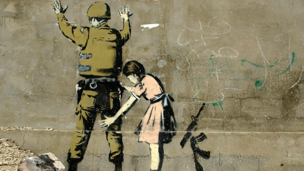 Banksy Stop And Search street art of girl frisking soldier on cracked wall wallpaper background