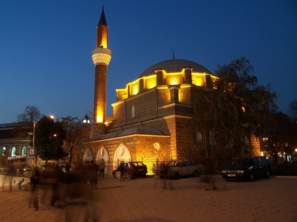 Banya Bashi Mosque in Bulgaria illuminated at dusk with historic architecture and evening sky Wallpaper