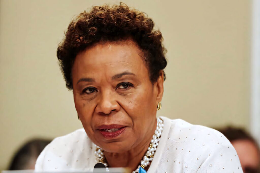 Close-up of Barbara Lee speaking with focused thoughtful expression leadership wallpaper background