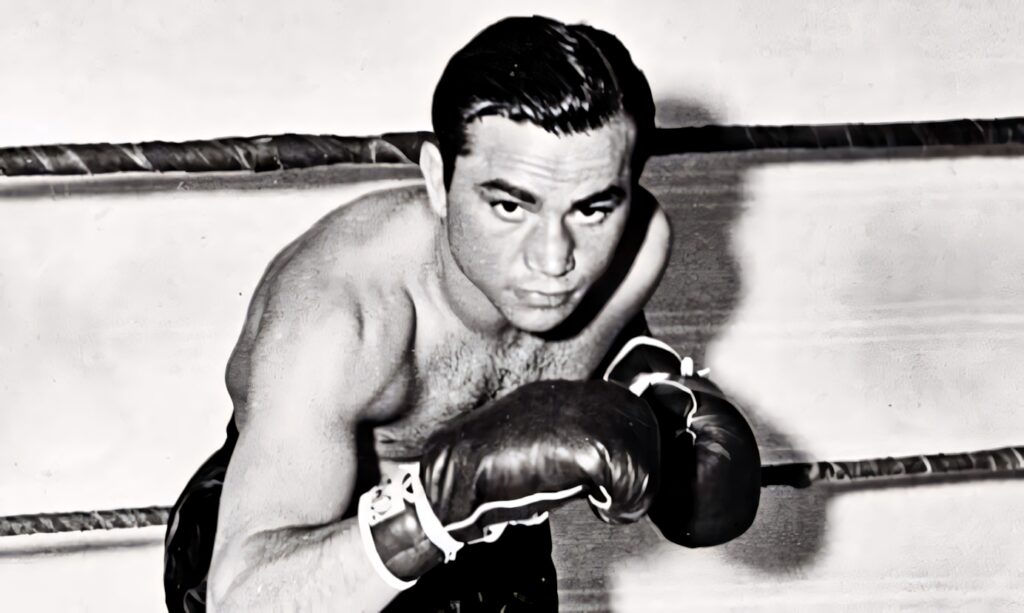 Barney Ross black and white boxer wallpaper showing focused determination in the boxing ring