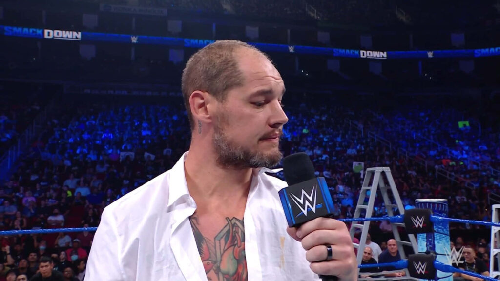 WWE Baron Corbin interview white shirt chest tattoo blue lit wrestling arena background wallpaper