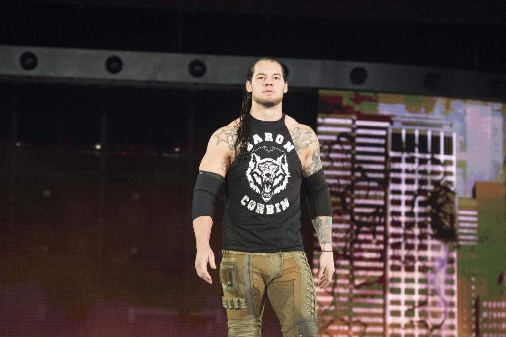 WWE Superstar Baron Corbin in ring showing Lone Wolf persona dynamic wrestling wallpaper