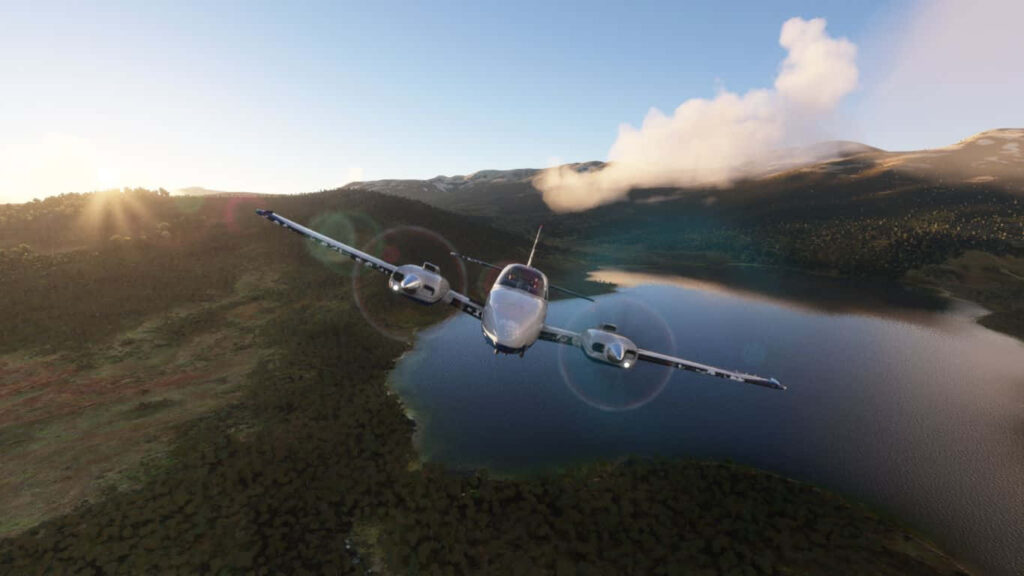 Baron G58: Twin-engine Marvel Soaring over Majestic Forest Lake Wallpaper