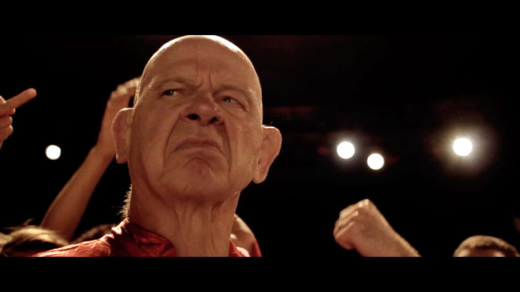Baron Von Raschke retired wrestler stern expression dramatic lighting The Claw documentary wallpaper