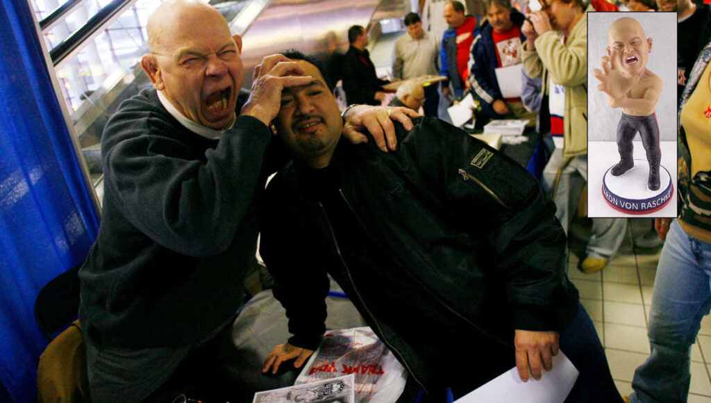 Baron Von Raschke retired wrestler posing playfully with fan at public event wallpaper background