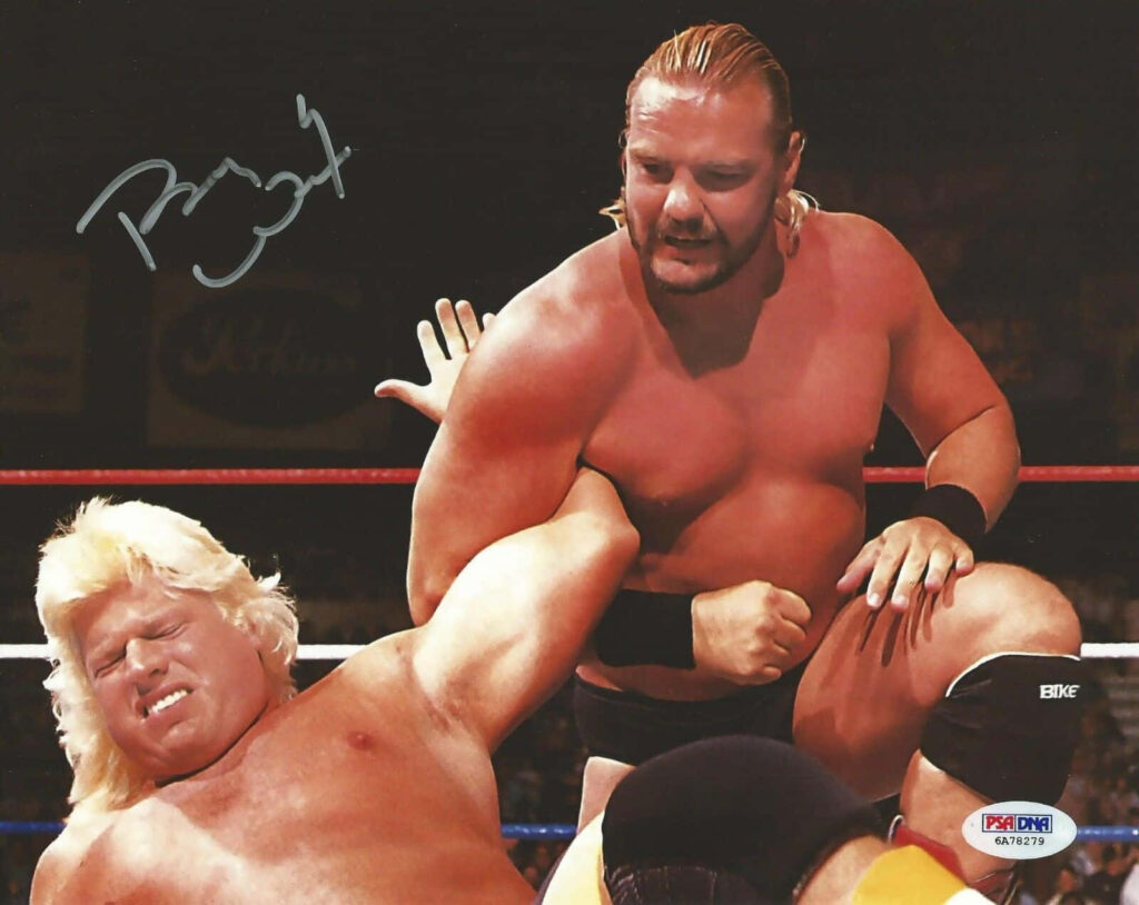 Barry Windham wrestling intensely with opponent in dramatic match showcasing fierce determination Wallpaper