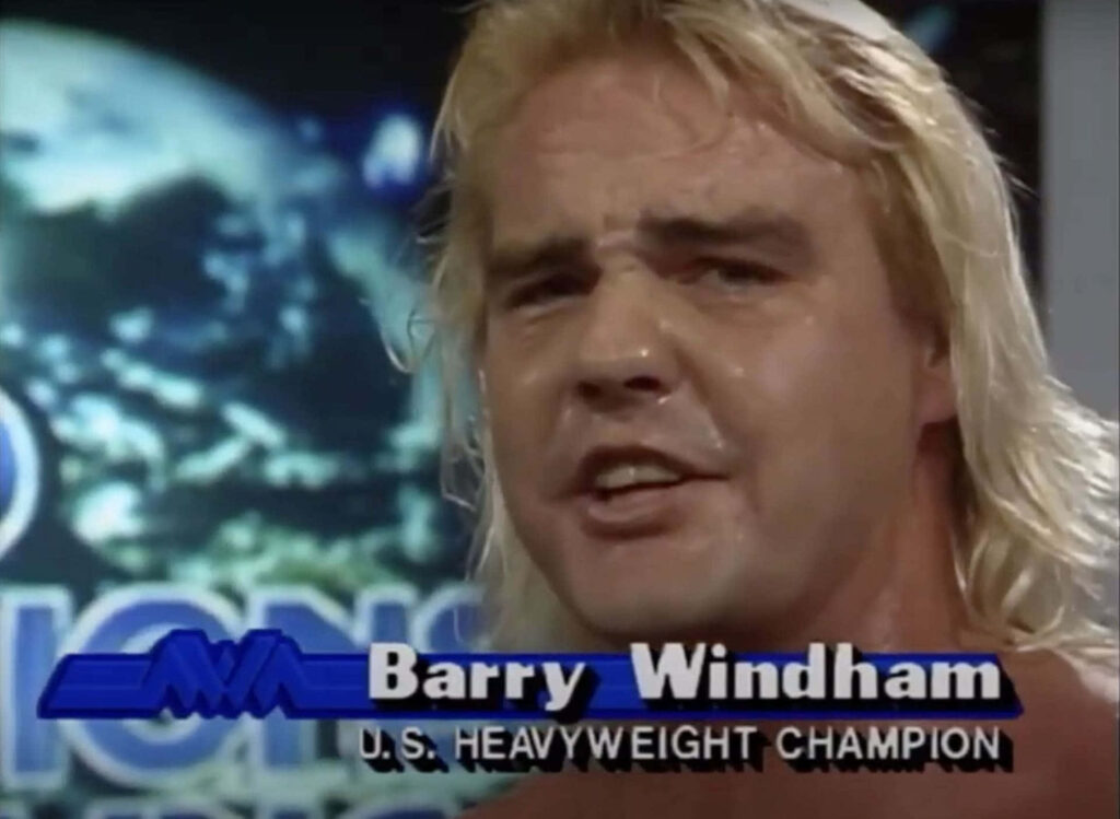 Barry Windham confident U.S. Heavyweight Champion holding title belt dynamic wallpaper background