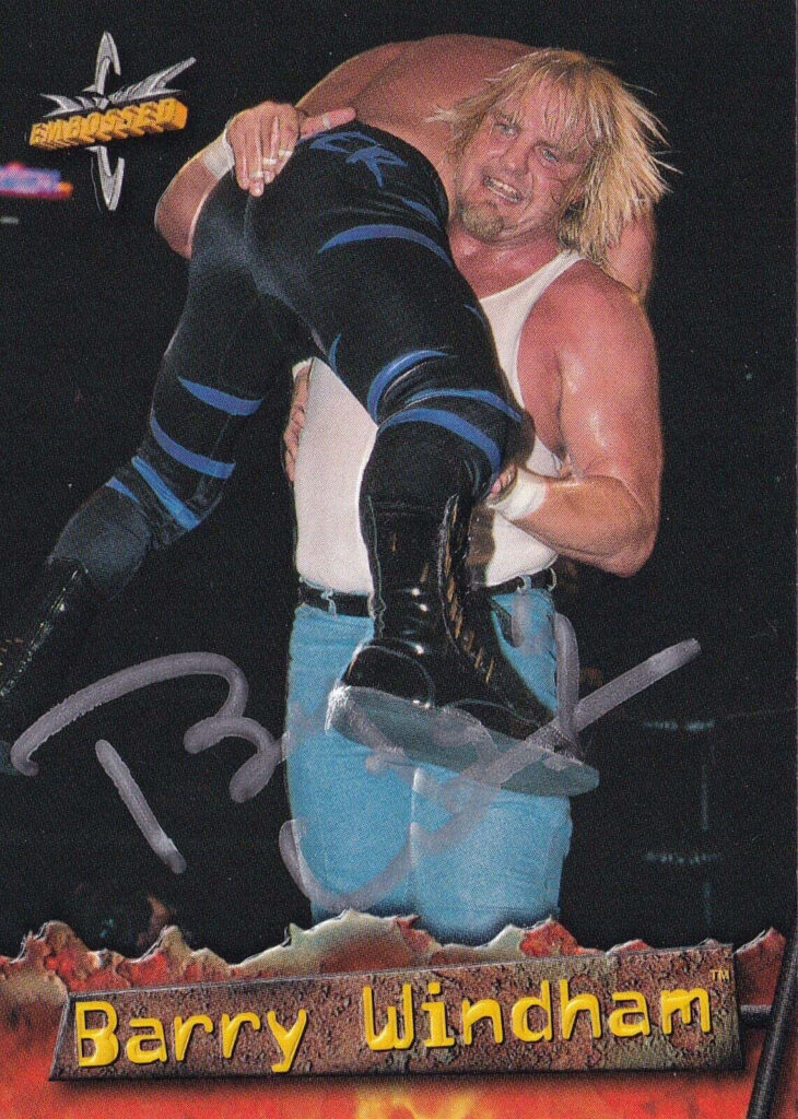 Barry Windham lifting opponent in wrestling ring showing strength and dominance wallpaper background
